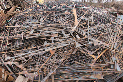 Steel waste from rebar close-up, scrap steel and other metal waste, preparation for recycling