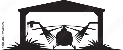 Black silhouette helicopter in hangar with grass and hose