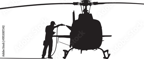 Black silhouette of man refueling helicopter