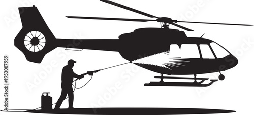Black silhouette of man washing helicopter with pressure washer