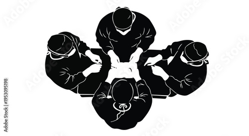 Business team meeting around table with documents and laptops in modern office setting with collaborative discussion