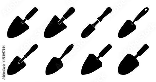 Silhouetted Garden Trowels in a Row, Essential Gardening Tools Displayed Neatly