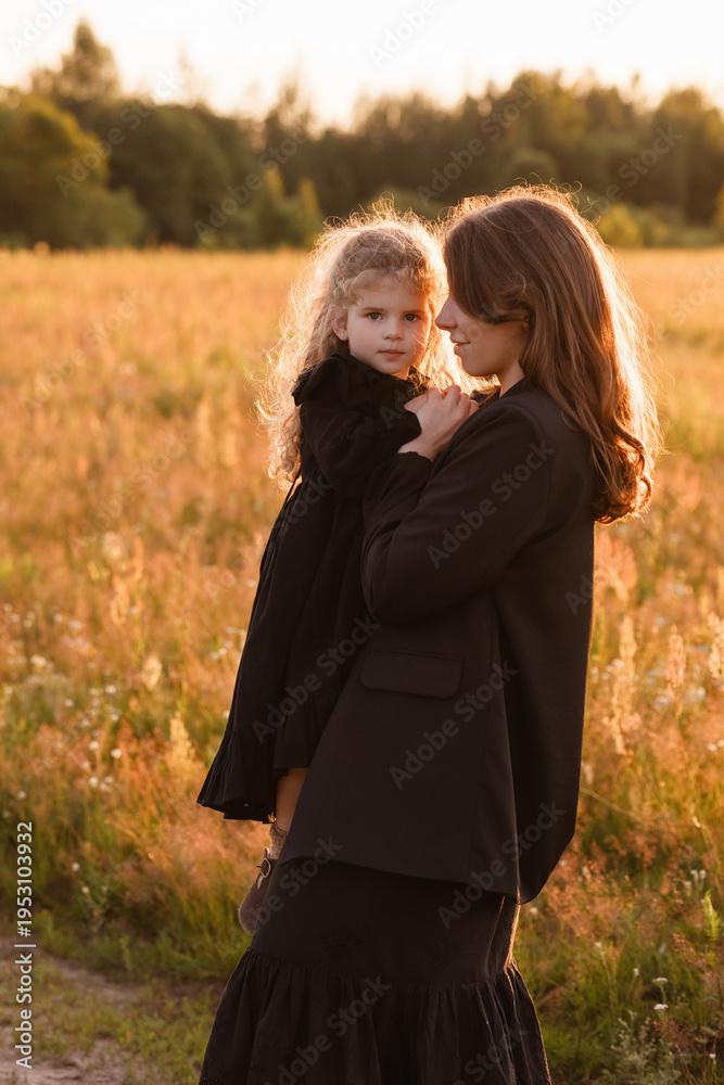 Fototapeta premium Caucasian Mother And Daughter In Close Hold In Golden Field, Mother Offering Comfort And Solace, Soft Facial Expression, Detailed Portrait Angle, Warm Backlight, Maternal Protection Theme