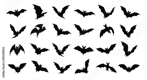 Flying silhouettes of bats in a dark night sky formation
