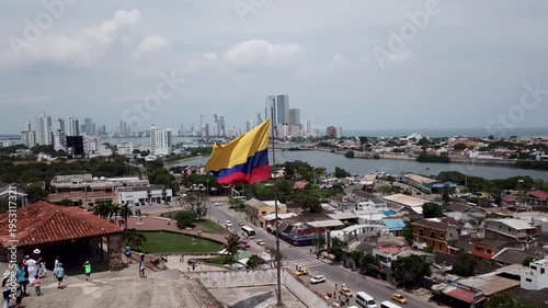 aerial view of colombian flag waving over cartagena fortress