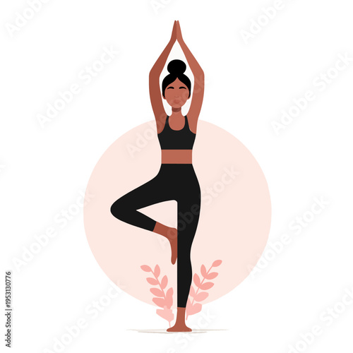 Black woman practicing yoga tree pose, balancing in fitness studio Healthy lifestyle, wellness, and mindfulness concept with serene expression