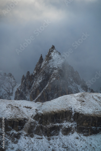 Snowy Mountain Peaks in Misty Weather
