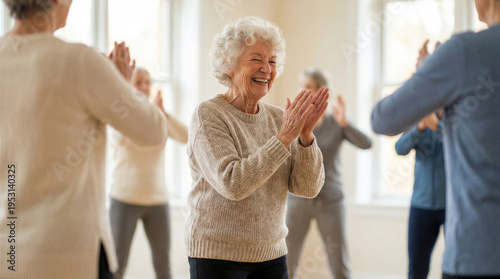 Wallpaper Mural Happy elderly woman clapping hands during group exercise class with seniors in a bright community center Torontodigital.ca