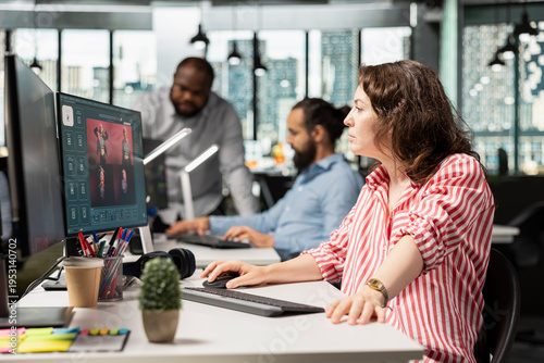 Cuadro en lienzo Employee uses virtual assistant and chatbot AI to generate images and materials, editing photography and applying color grading