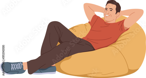 Happy Young Man Relaxing on a Comfortable Yellow Bean Bag Chair