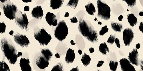 Hand drawn black ink leopard spots, polka dot on beige background for design, textiles, packaging, fabrics, and home decor wallpapers