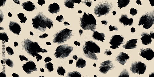 Hand drawn black ink leopard spots, polka dot on beige background for design, textiles, packaging, fabrics, and home decor wallpapers