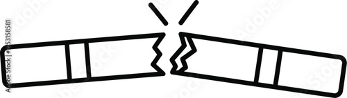 A broken rectangular object with a visible fracture line in the middle