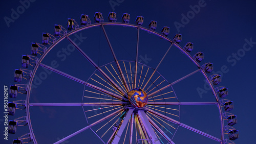 Photos Ferris wheel lights shining brightly, creating an exciting atmosphere at a funfa