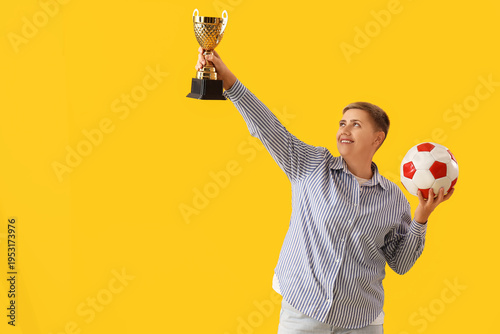 Female soccer fan with ball...