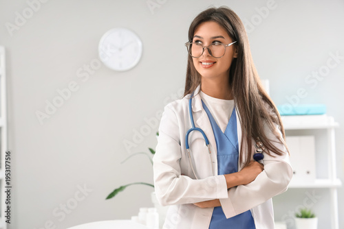Dreaming female doctor in clinic