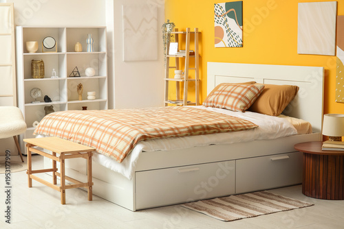 Comfortable bed, table and ...