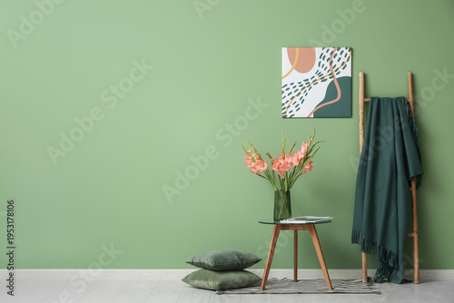 Stepladder, table and vase ...