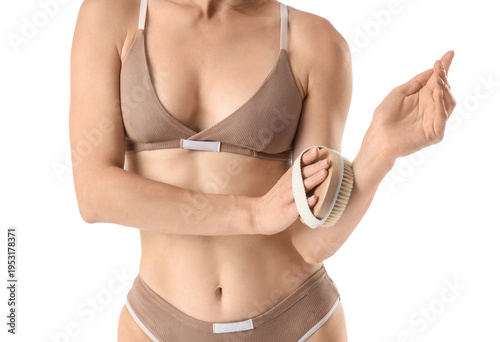 Young woman massaging her a...