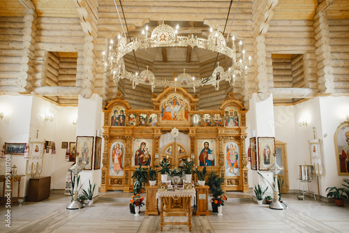 Tableau sur toile Orthodox church interior featuring ornate iconostasis and chandelier