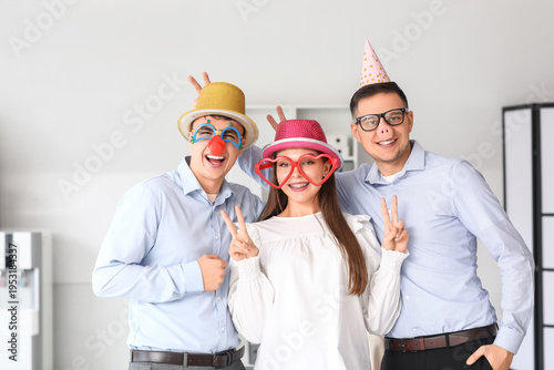 Young colleagues with funny...