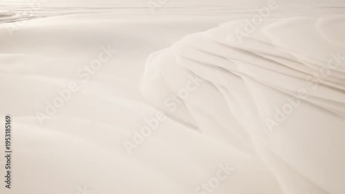 Smooth cream colored fabric texture with flowing folds and soft wrinkles