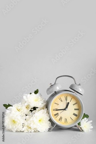 Alarm clock with chrysanthe...