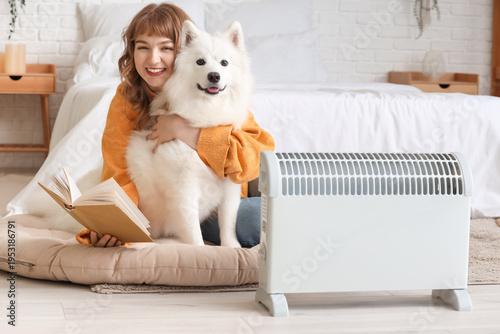 Young woman with cute dog r...