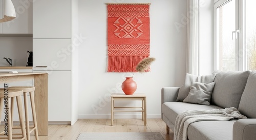Cozy Living Room Interior With Textured Red And White Wall Hanging And Beige Sofa