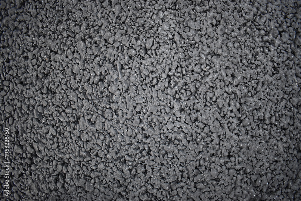 Fototapeta premium Close up texture of dark gray asphalt pavement.
