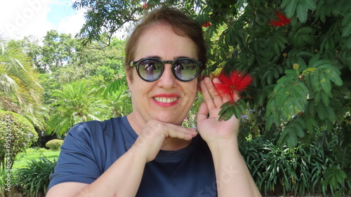 Woman with red flower