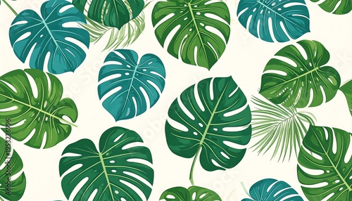 Tropical leaves of various shades arranged on a cream background