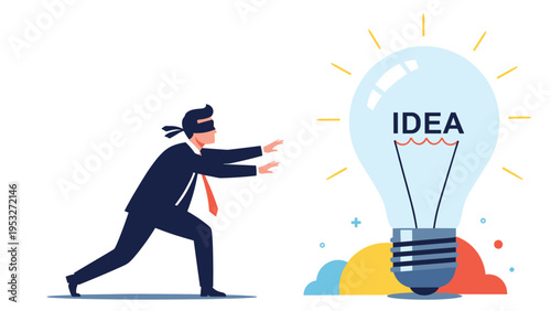 Blindfolded businessman reaching out his hands towards a giant glowing light bulb containing the word idea in it.