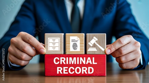 Criminal record concept with businessman holding blocks legal background check and law concept