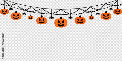Halloween decorations featuring illuminated jack o lanterns and spooky spiders