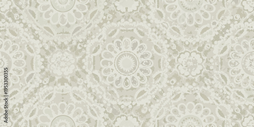 Intricate floral and circular pattern in a muted beige and white