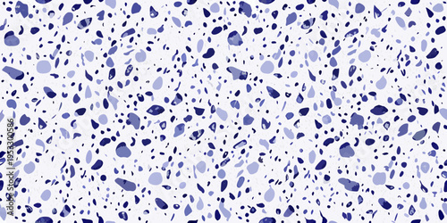 Abstract pattern of irregular blue shapes scattered on a white background