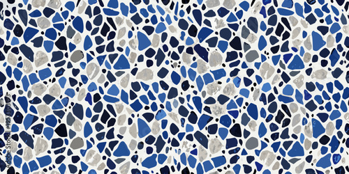 Abstract mosaic pattern featuring irregular blue gray and white tiles
