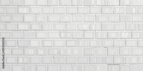 Close up of a white tiled wall with a repetitive rectangular pattern