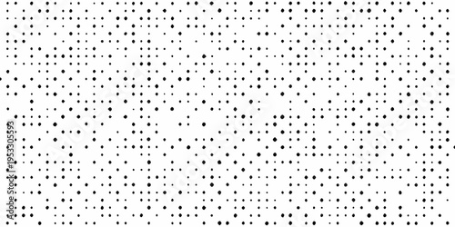 A dense pattern of small black dots scattered across a white background
