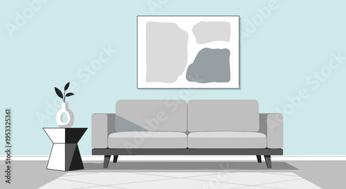Minimalist living room interior with a comfortable gray sofa and a stylish side table.