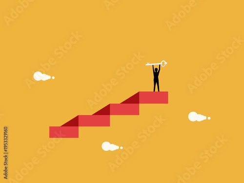 businessman held the keys on the tall staircase.