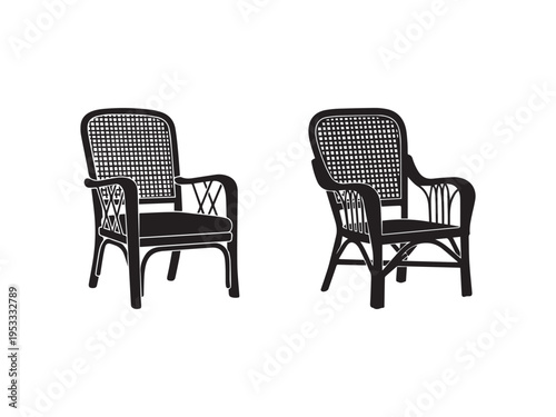Two black wicker chairs with armrests and cushions on seats facing different directions  simple furniture design