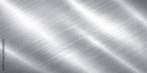 Polished silver brushed metal texture background with a shiny industrial chrome surface and light reflection on a grey stainless steel plate material