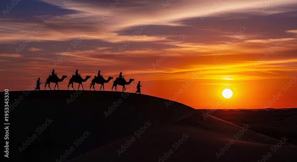 Fototapeta premium A silhouette of a camel caravan walking along a desert dune during a vibrant golden sunset sky