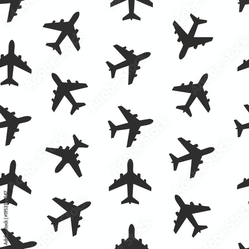 A repeating pattern of dark gray airplane silhouettes against a white background