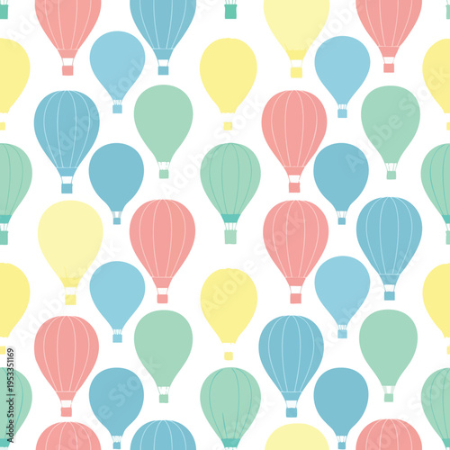 Seamless pattern of pastel hot air balloons in various sizes and colors