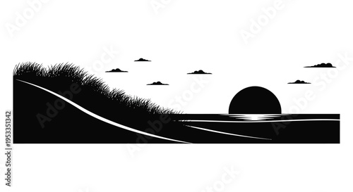 Dramatic landscape with setting sun and grassy foreground silhouette