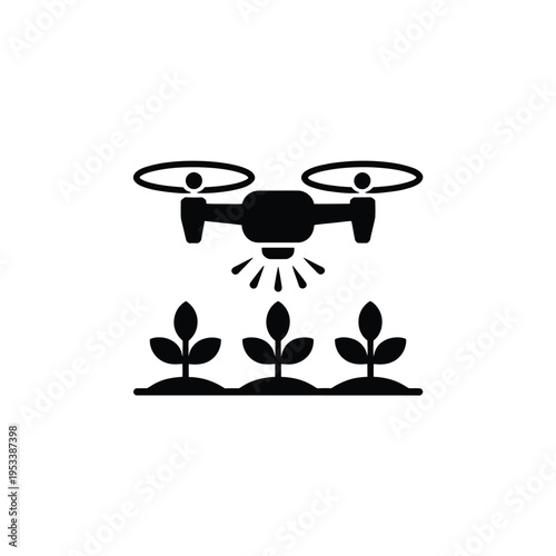 A black silhouette of a drone spraying crops in a field