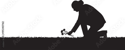 Woman silhouette planting flowers in memorial park with grass and background